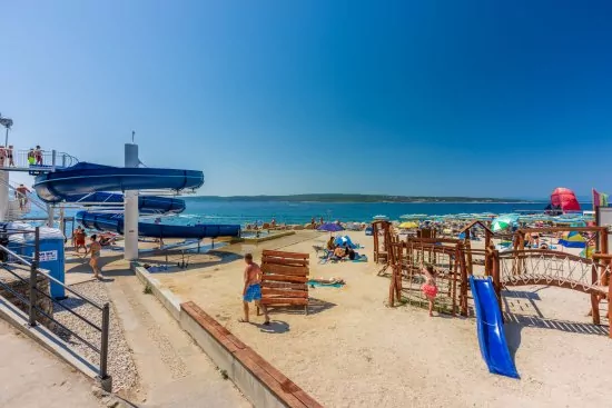 Selce a pláž poli Mora.