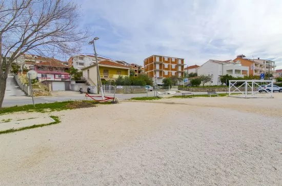 Oblázková pláž - Okrug Gornji Copacabana.