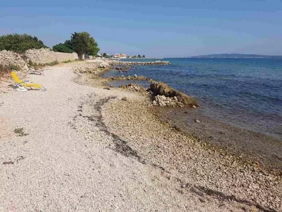 Moře a pláž přímo u domu.