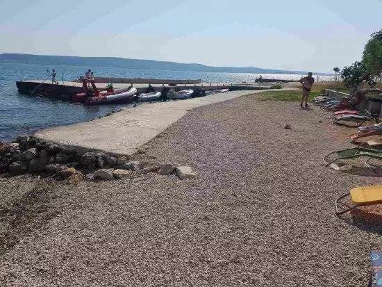 Moře a pláž přímo u domu.