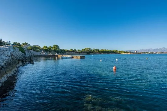 Moře a pláž přímo před domem.