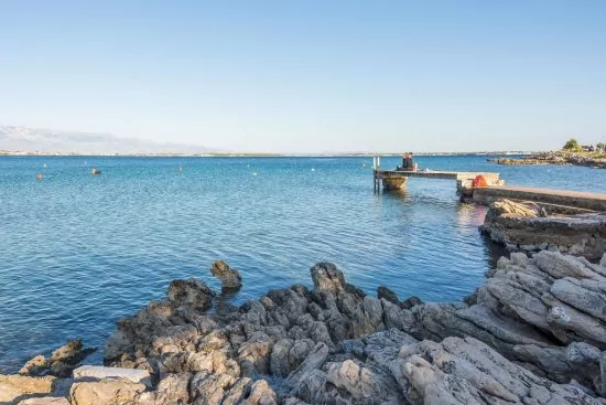 Moře a pláž přímo před domem.