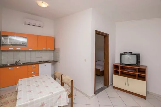 Obývací pokoj s kuchyní.